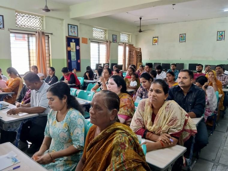 Parents at an orientation session in a classroom